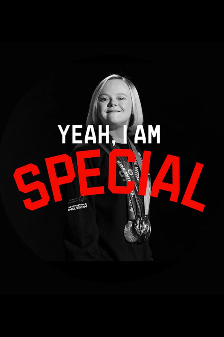Person wearing a shirt with 'Yeah, I am special' text on a black background
